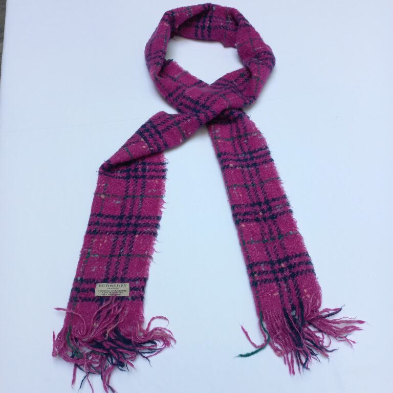 Authentic Burberry pink checkered scarf in soft wool, shown neatly folded with fringes. Luxury fashion at affordable price from abbottbrands on lajimart.com. Ideal for gifting and cold-weather styling.