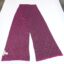 A Michael Kors monogram scarf in magenta and charcoal gray laid flat on a white surface to show the full pattern.